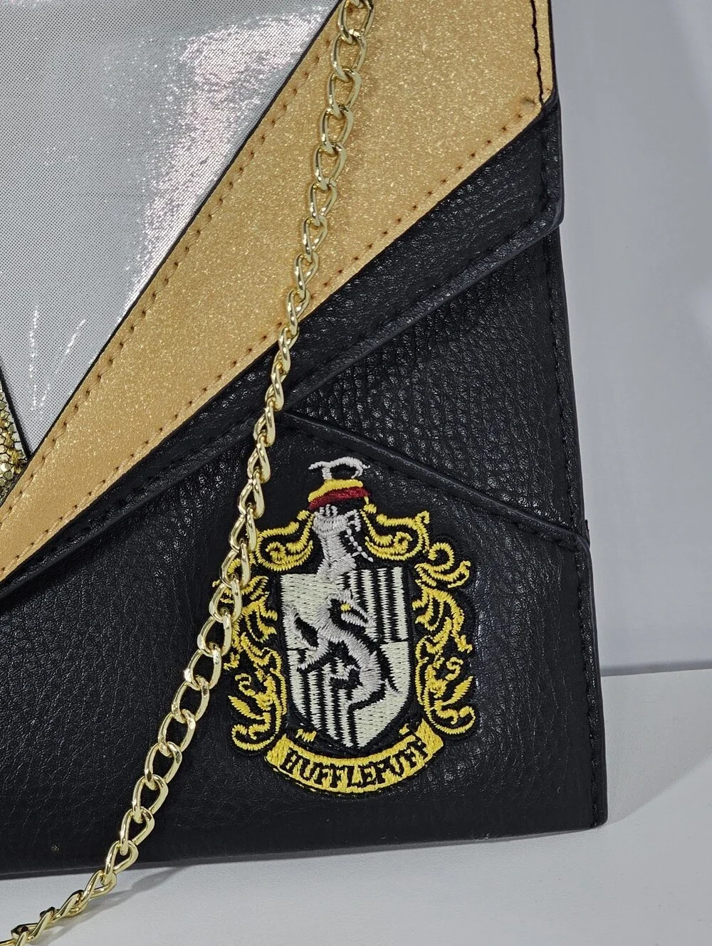 Danielle Nicole x Harry Potter Hufflepuff Uniform Clutch Gold Chain